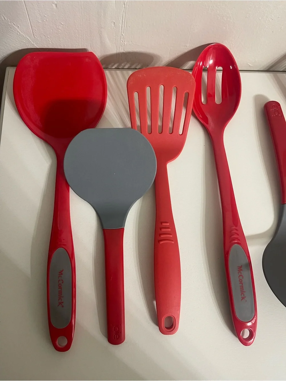Bundle of Seven Red Silicone Kitchen Utensils